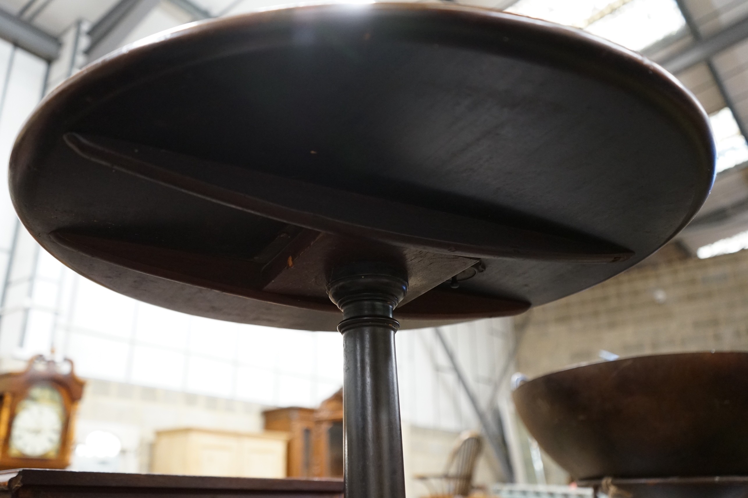 A George III and later circular inlaid mahogany tilt top tripod table, diameter 59cm, height 71cm